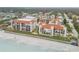 Aerial view of beachfront building and landscape at 3001 S Atlantic Ave # 501, New Smyrna Beach, FL 32169