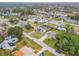 Aerial view of a residential property with pool and yard at 3039 Tamarind Dr, Edgewater, FL 32141