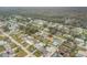 Aerial image showcasing neighborhood homes and surrounding landscape at 3039 Tamarind Dr, Edgewater, FL 32141