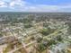 Aerial view of residential neighborhood with houses and pools at 3039 Tamarind Dr, Edgewater, FL 32141