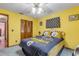 Bright bedroom with double bed and closet at 3039 Tamarind Dr, Edgewater, FL 32141