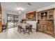 Bright dining area with table and hutch, near pool access at 3039 Tamarind Dr, Edgewater, FL 32141