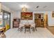 Dining room with chandelier and views to the kitchen and living room at 3039 Tamarind Dr, Edgewater, FL 32141