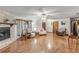 Spacious living room featuring hardwood floors and a fireplace at 3039 Tamarind Dr, Edgewater, FL 32141