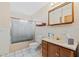 Bathroom with vanity, shower/tub combo and tiled flooring at 3120 Pine Tree Dr, Edgewater, FL 32141