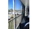 Relaxing balcony with outdoor seating, offering water views at 315 N Causeway # 304, New Smyrna Beach, FL 32169