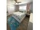 Spacious bedroom with king-size bed and coastal decor at 315 N Causeway # 304, New Smyrna Beach, FL 32169