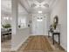 Bright entryway with a jute rug and a console table at 3203 Monaco Blvd, New Smyrna Beach, FL 32168