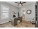 Home office with built-in shelving and view into bathroom at 3203 Monaco Blvd, New Smyrna Beach, FL 32168