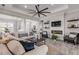 Spacious living room with sectional sofa and a view of the dining room at 3203 Monaco Blvd, New Smyrna Beach, FL 32168