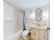 Clean bathroom with shower/tub and updated vanity at 325 Causeway # E 203, New Smyrna Beach, FL 32169