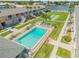 Aerial view of community pool and surrounding buildings at 335 N Causeway # H050, New Smyrna Beach, FL 32169