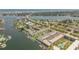 Wide aerial view of waterfront property and surrounding area at 335 N Causeway # H050, New Smyrna Beach, FL 32169