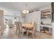 Dining area with built-in shelving and view of canal at 335 N Causeway # H050, New Smyrna Beach, FL 32169