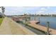 Community boardwalk and dock offering scenic waterfront access at 335 N Causeway # H050, New Smyrna Beach, FL 32169