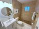 Updated bathroom with walk-in shower, toilet and vanity with vessel sink at 335 N Causeway # H23, New Smyrna Beach, FL 32169