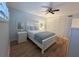 Bedroom with full-size bed and white built-in closet at 335 N Causeway # H23, New Smyrna Beach, FL 32169