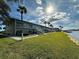 Building exterior, water views, grassy area at 335 N Causeway # H23, New Smyrna Beach, FL 32169