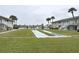 Shuffleboard courts and waterfront view at 335 N Causeway # H23, New Smyrna Beach, FL 32169