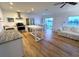 Modern kitchen with stainless steel appliances and white shaker cabinets at 335 N Causeway # H23, New Smyrna Beach, FL 32169