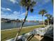 Stunning waterfront view with palm trees and boats at 335 N Causeway # H23, New Smyrna Beach, FL 32169