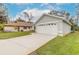 One-story home with attached garage and expansive driveway at 3441 Gaveson Ct, Port Orange, FL 32129
