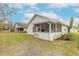 View of house exterior and backyard at 3441 Gaveson Ct, Port Orange, FL 32129
