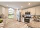 Well-equipped kitchen with stainless steel appliances and granite countertops at 3441 Gaveson Ct, Port Orange, FL 32129