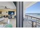 Balcony with ocean view and comfortable seating at 401 N Atlantic Ave # 504, New Smyrna Beach, FL 32169