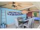 Bright dining area with beachy decor and seating at 401 N Atlantic Ave # 504, New Smyrna Beach, FL 32169