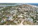 Wide aerial view of neighborhood near beach at 405 / 407 S Cooper St # 1 / 2, New Smyrna Beach, FL 32169