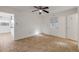 Bright bonus room with tile floors and access to kitchen at 405 / 407 S Cooper St # 1 / 2, New Smyrna Beach, FL 32169