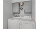 Bright laundry room, including a washer and dryer set at 405 / 407 S Cooper St # 1 / 2, New Smyrna Beach, FL 32169