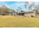 Spacious backyard offering ample outdoor space at 413 Division Ave, Ormond Beach, FL 32174