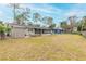 Large backyard with shed and plenty of green space at 413 Division Ave, Ormond Beach, FL 32174