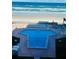 Elevated view of oceanfront pool and beach at 4141 S Atlantic Ave # 602, New Smyrna Beach, FL 32169