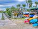 Outdoor kayak storage with a dock at 434 Bouchelle Dr # 202, New Smyrna Beach, FL 32169