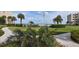 Scenic walkway to beach, lush landscaping, ocean views at 4501 S Atlantic Ave # 5180, New Smyrna Beach, FL 32169