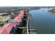 Panoramic aerial shot of waterfront condominiums, docks, and Intracoastal Waterway at 456 Bouchelle Dr # 202, New Smyrna Beach, FL 32169