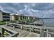 Scenic view of the community dock, with boats and waterfront living at its finest at 456 Bouchelle Dr # 202, New Smyrna Beach, FL 32169