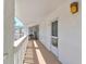 White hallway with access to condo unit and balcony at 4590 S Atlantic Ave # 258A, Ponce Inlet, FL 32127