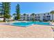 Community pool with ample deck space at 4590 S Atlantic Ave # 258A, Ponce Inlet, FL 32127