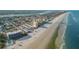 Wide aerial view of the property and coastline at 505 N Atlantic Ave # 29, New Smyrna Beach, FL 32169