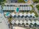 Aerial view showing the community pool and parking at 505 N Atlantic Ave # 29, New Smyrna Beach, FL 32169