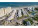 Aerial view showing beachside location near pool and tennis court at 505 N Atlantic Ave # 29, New Smyrna Beach, FL 32169