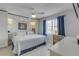 Spacious main bedroom with king-size bed and built-in shelving at 505 N Atlantic Ave # 29, New Smyrna Beach, FL 32169