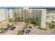 Condo building's parking lot and beachfront view at 5203 S Atlantic Ave # 412B, New Smyrna Beach, FL 32169