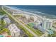 Expansive aerial view of coastal community and beachfront at 5203 S Atlantic Ave # 412B, New Smyrna Beach, FL 32169