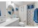 Clean bathroom with shower, toilet and vanity at 5203 S Atlantic Ave # 412B, New Smyrna Beach, FL 32169