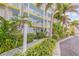 Lush landscaping surrounds this condo building, offering a tropical feel at 5203 S Atlantic Ave # 412B, New Smyrna Beach, FL 32169